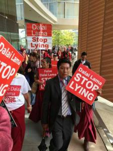 Adar Tsering (middle) with NKT ISC protesters.